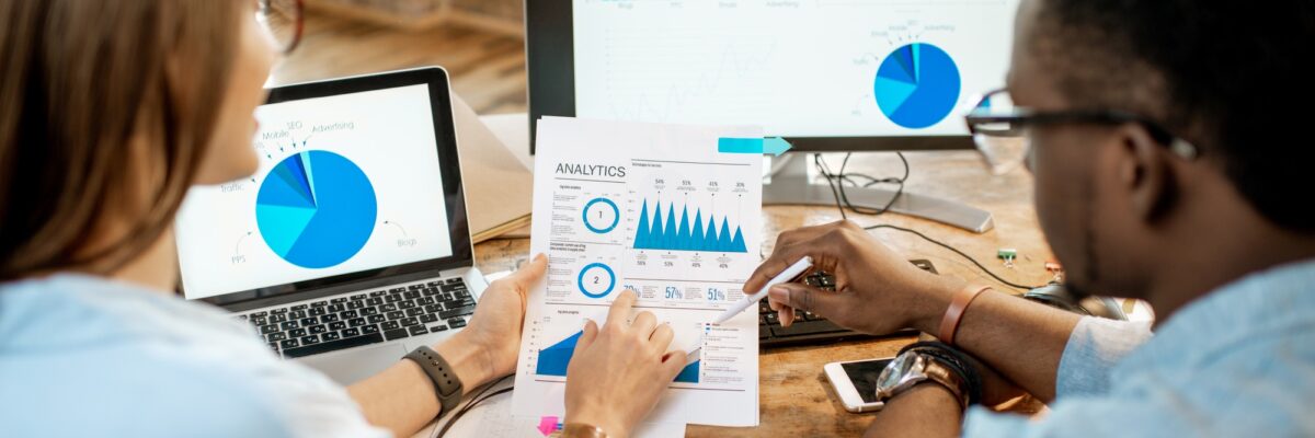 Coworkers working together with analytics